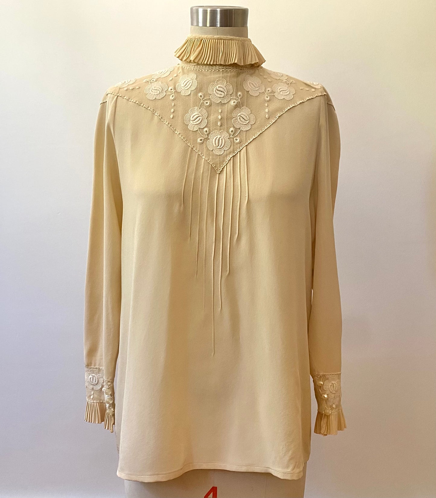 Edwardian style button up top. Fits like medium. Bust: 40" | Waist: 38" | Shoulder Width: 36" | Length: 26" | Sleeve Length: 21.5" | Fabric Content: 100% Silk | Era: 1980s | Brand/Maker/Country of Origin: Chloe, Made in France | Condition: Excellent